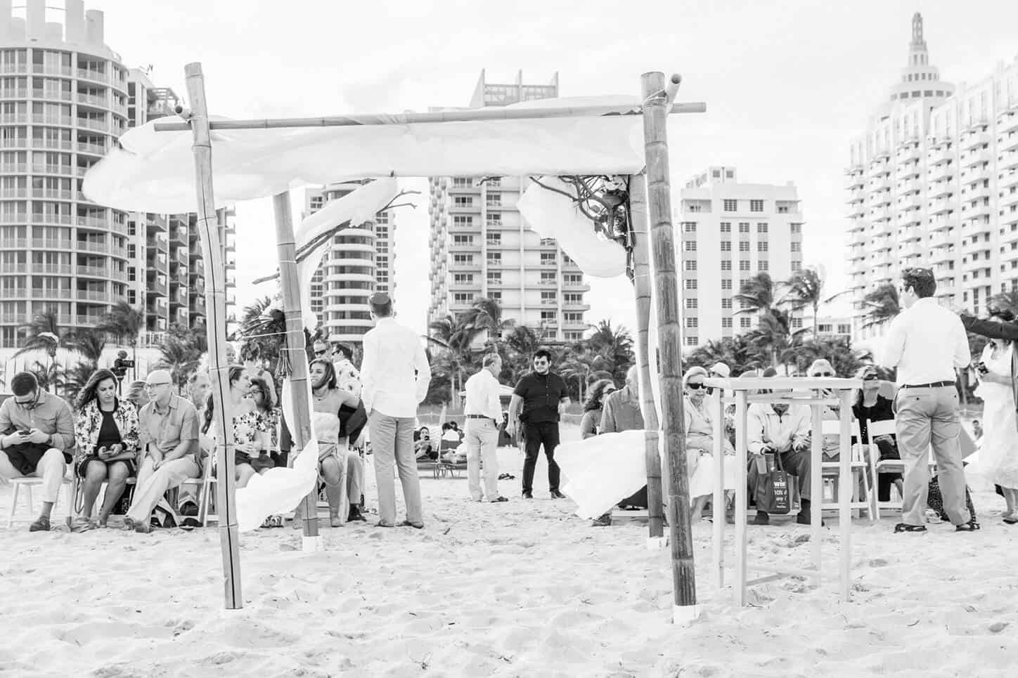 Jewish wedding ceremony on the beach by wedding photographer in Miami beach
