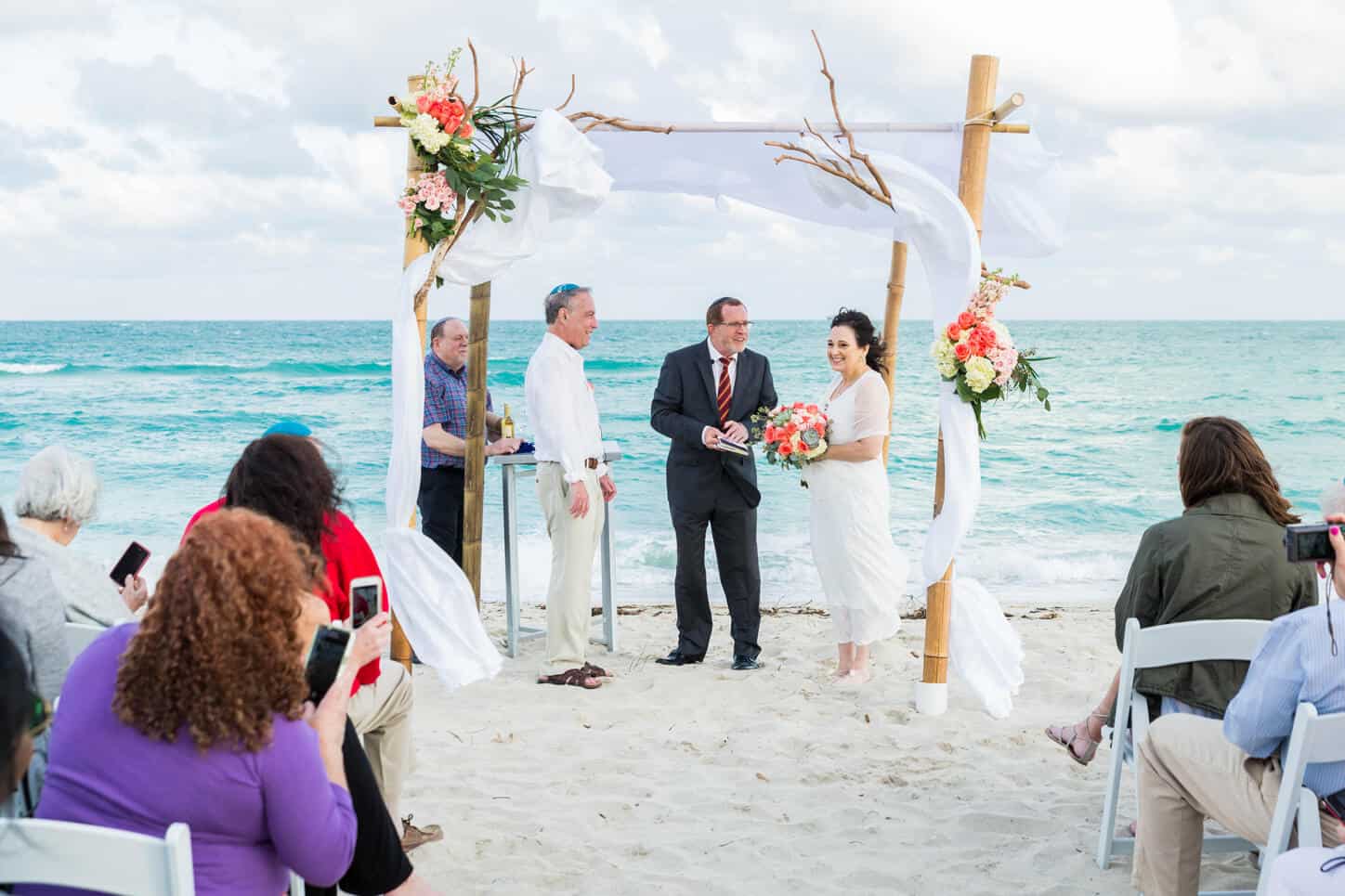 Photo of Jewish Wedding Vendor officiating wedding ceremony on Miami Beach, FL | By White House Wedding Photography