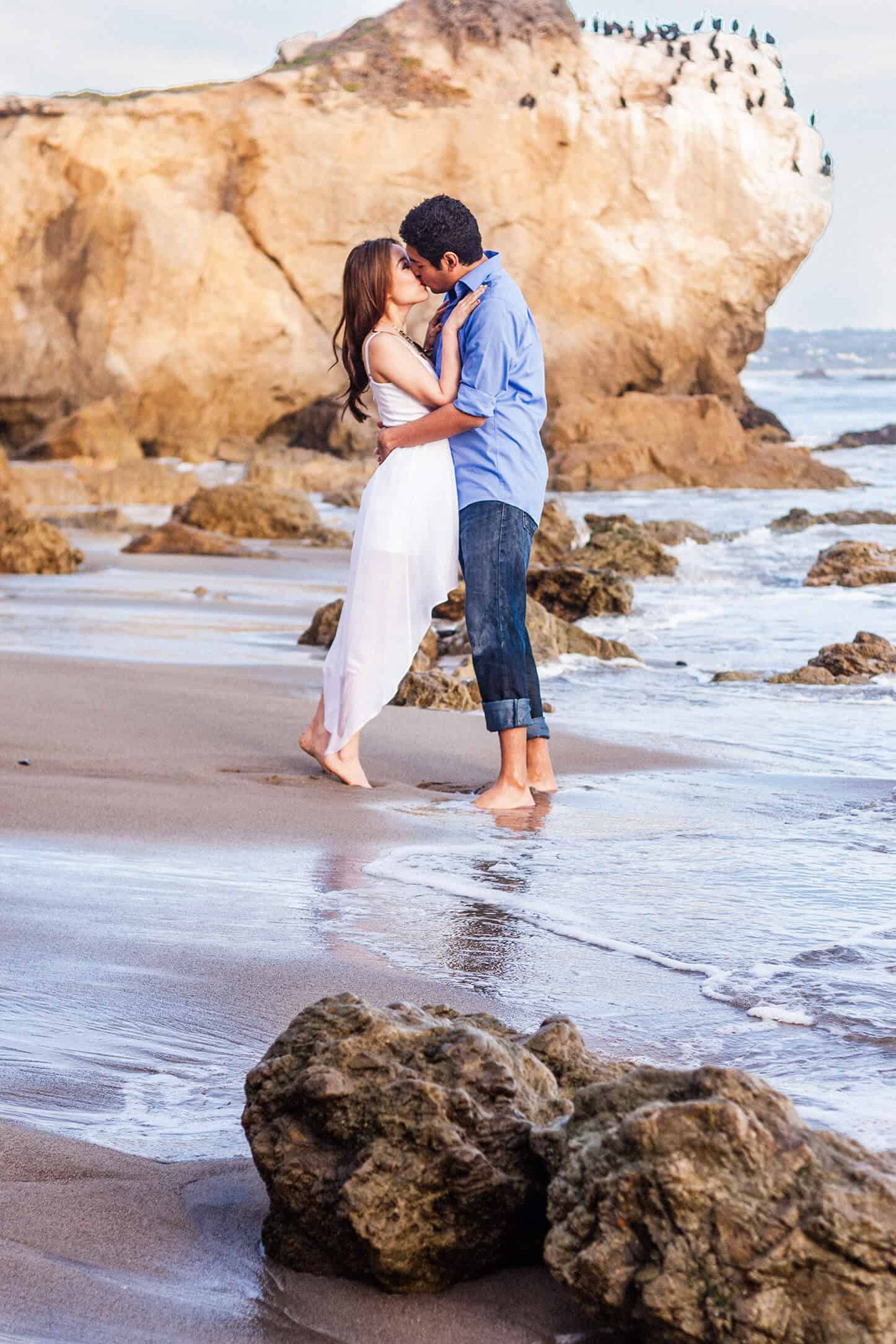 Photo of a couple kissing on the beach in Malibu, CA | White House Wedding Photography