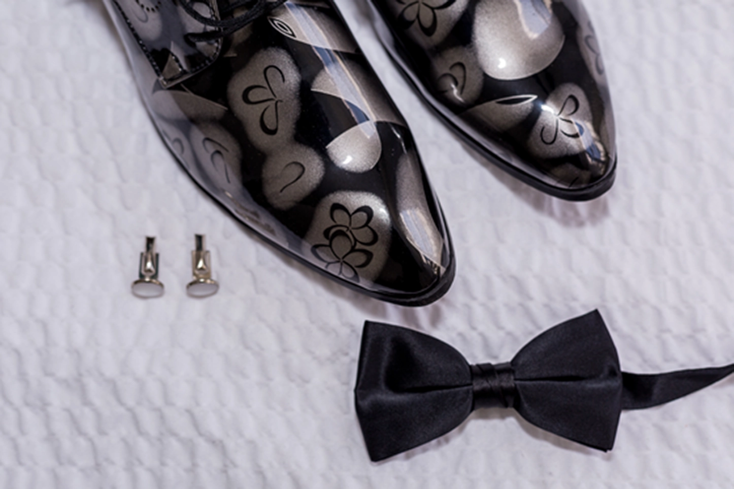 Detail shot of groom’s accessories before a Bamboo Gallery wedding in Fort Lauderdale