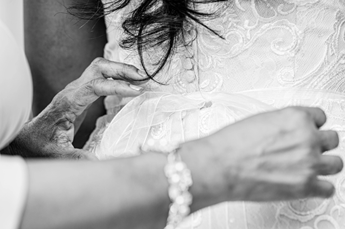 Detail shot of a wedding dress hanging before a Bamboo Gallery wedding in Fort Lauderdale