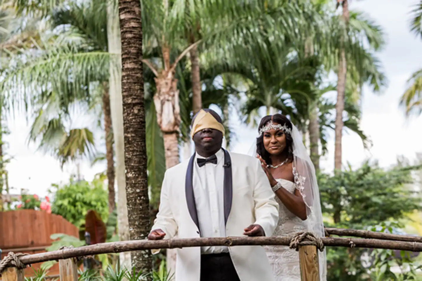 Bride and groom share an emotional first look at the lush Bamboo Gallery wedding venue in Davie, Florida.