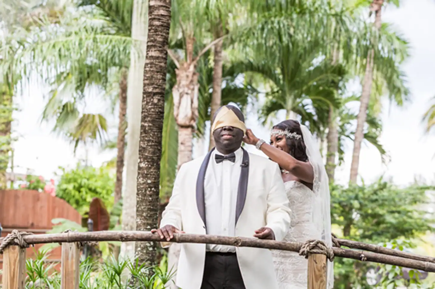 Bride and groom share an emotional first look at the lush Bamboo Gallery wedding venue in Davie, Florida.