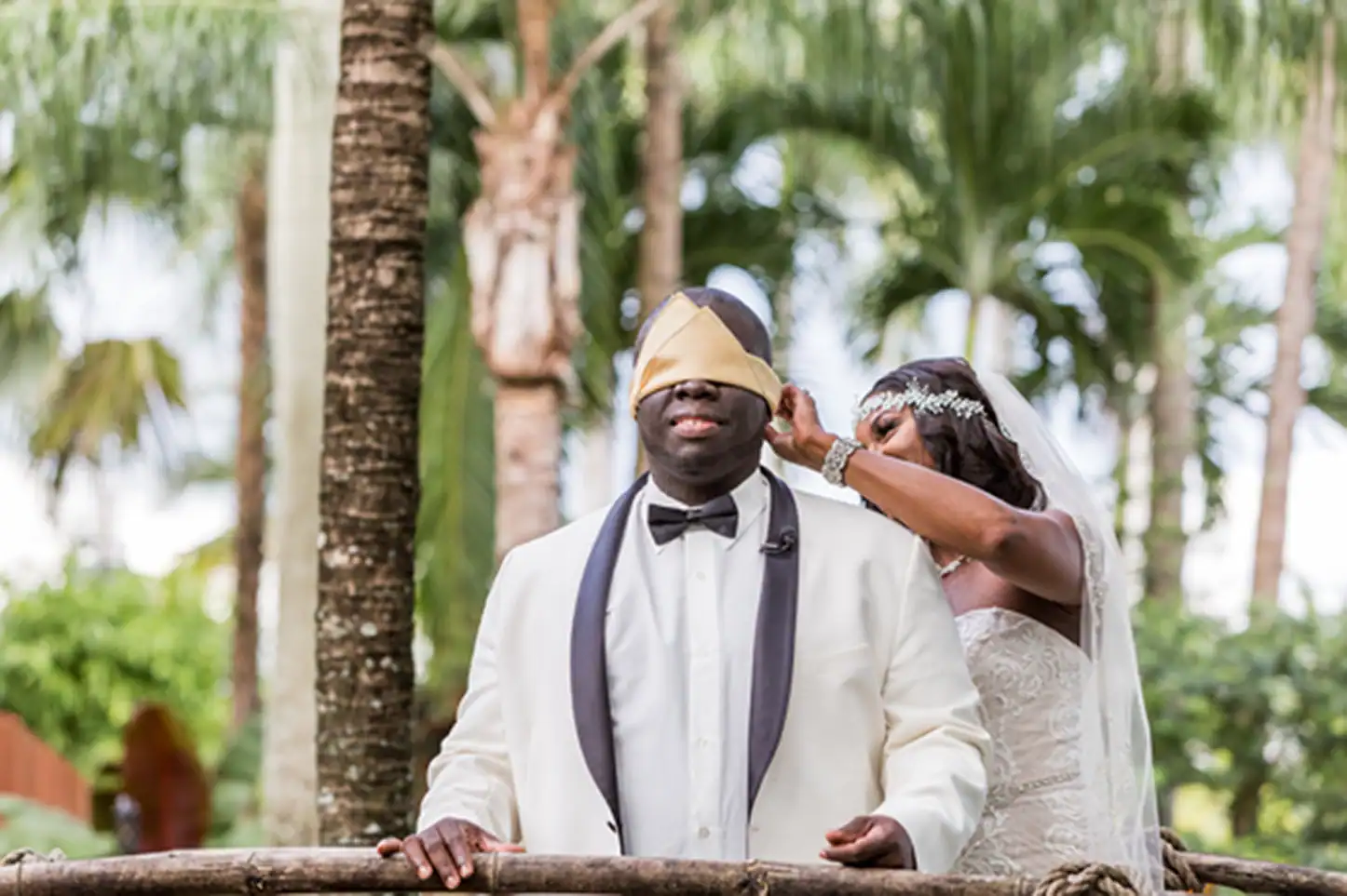 Bride and groom share an emotional first look at the lush Bamboo Gallery wedding venue in Davie, Florida.