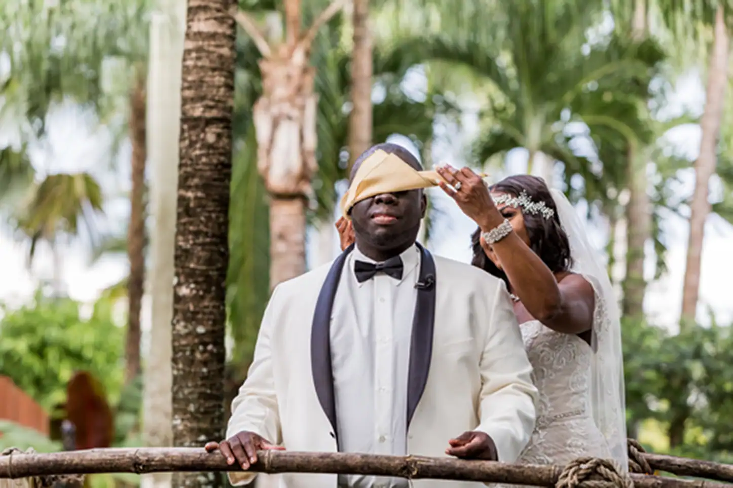 Bride and groom share an emotional first look at the lush Bamboo Gallery wedding venue in Davie, Florida.
