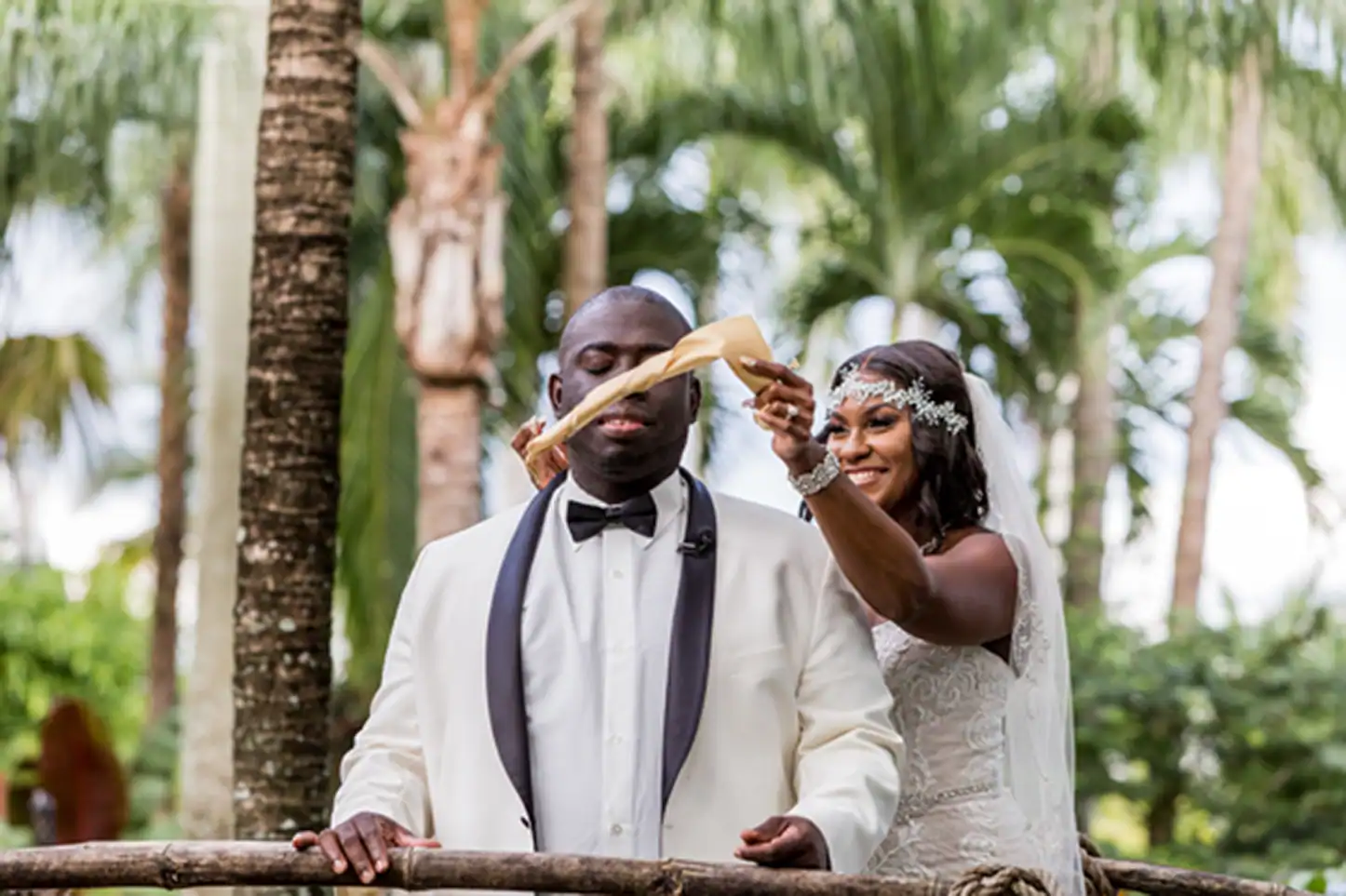 Bride and groom share an emotional first look at the lush Bamboo Gallery wedding venue in Davie, Florida.
