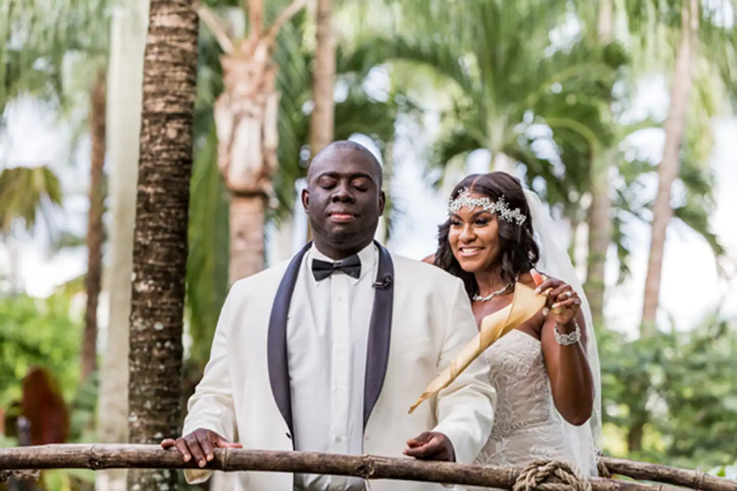Bride and groom share an emotional first look at the lush Bamboo Gallery wedding venue in Davie, Florida.