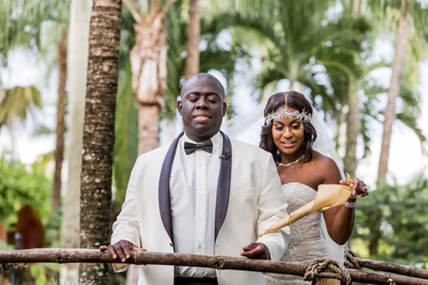 Bride and groom share an emotional first look at the lush Bamboo Gallery wedding venue in Davie, Florida.