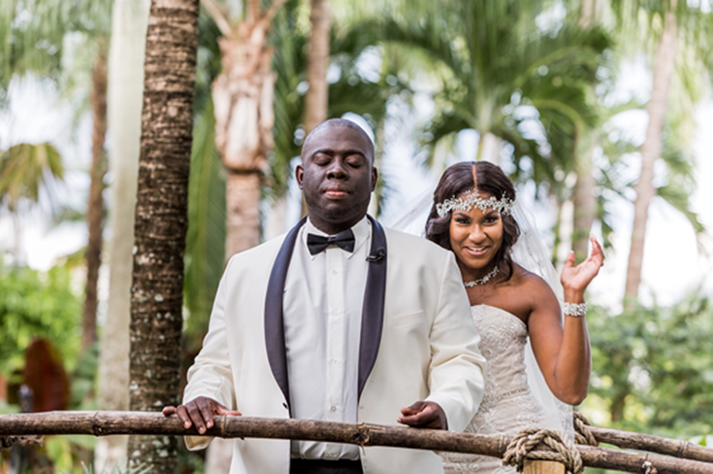 Bride and groom share an emotional first look at the lush Bamboo Gallery wedding venue in Davie, Florida.