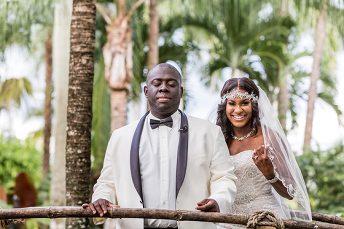 Bride and groom share an emotional first look at the lush Bamboo Gallery wedding venue in Davie, Florida.