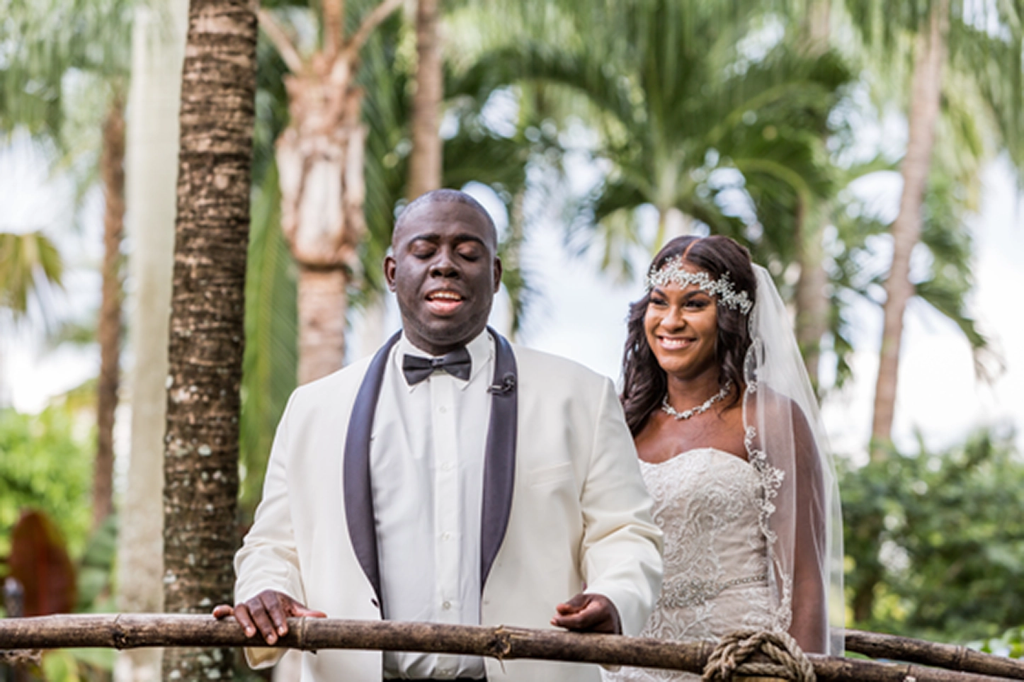 Bride and groom share an emotional first look at the lush Bamboo Gallery wedding venue in Davie, Florida.