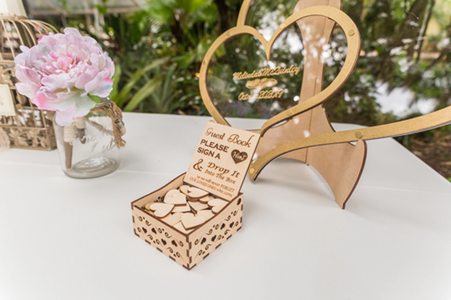 Detail shot of guests’ welcome table decorated for a Bamboo Gallery wedding in Davie, South Florida