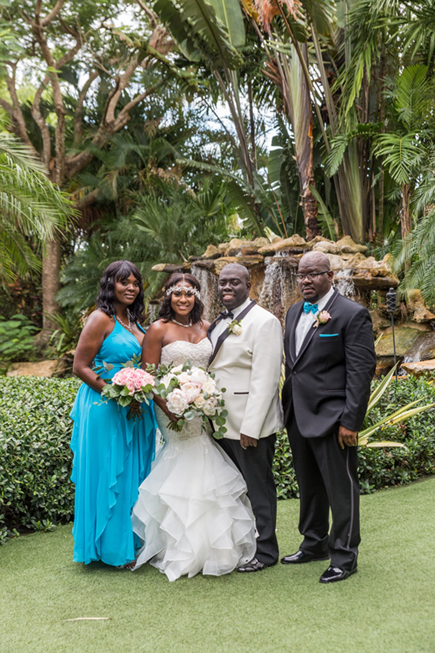 Bride, groom, and wedding party celebrating at the Bamboo Gallery wedding venue in Davie, Florida.