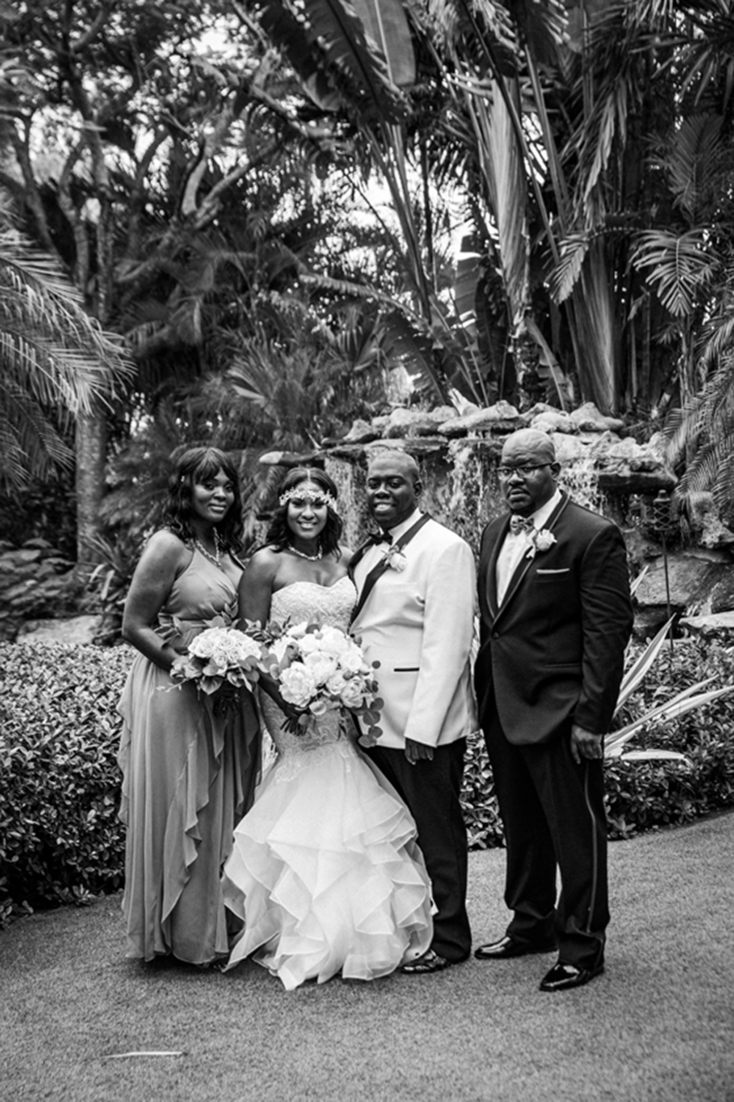 Bride, groom, and wedding party celebrating at the Bamboo Gallery wedding venue in Davie, Florida.