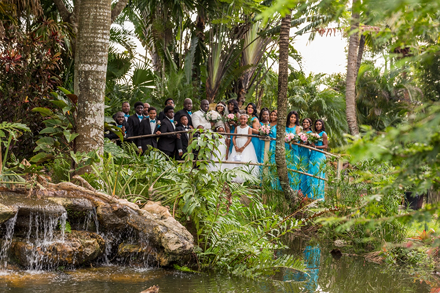 Bride, groom, and wedding party celebrating at the Bamboo Gallery wedding venue in Davie, Florida.